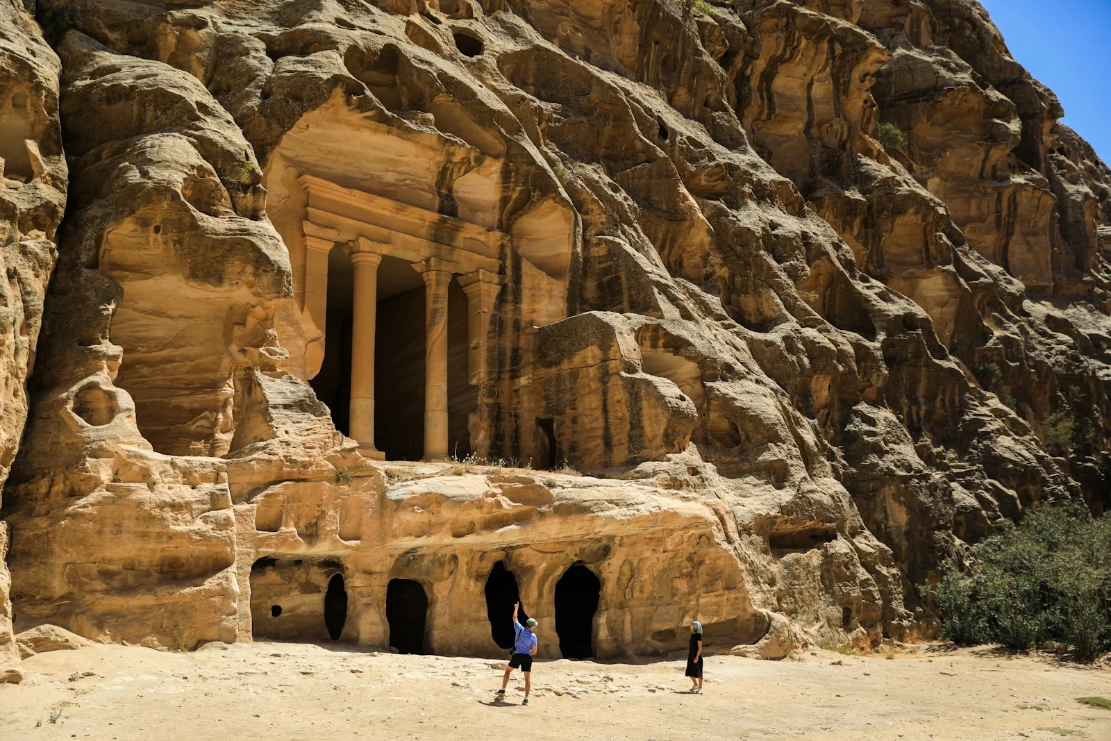 people walking in a desert