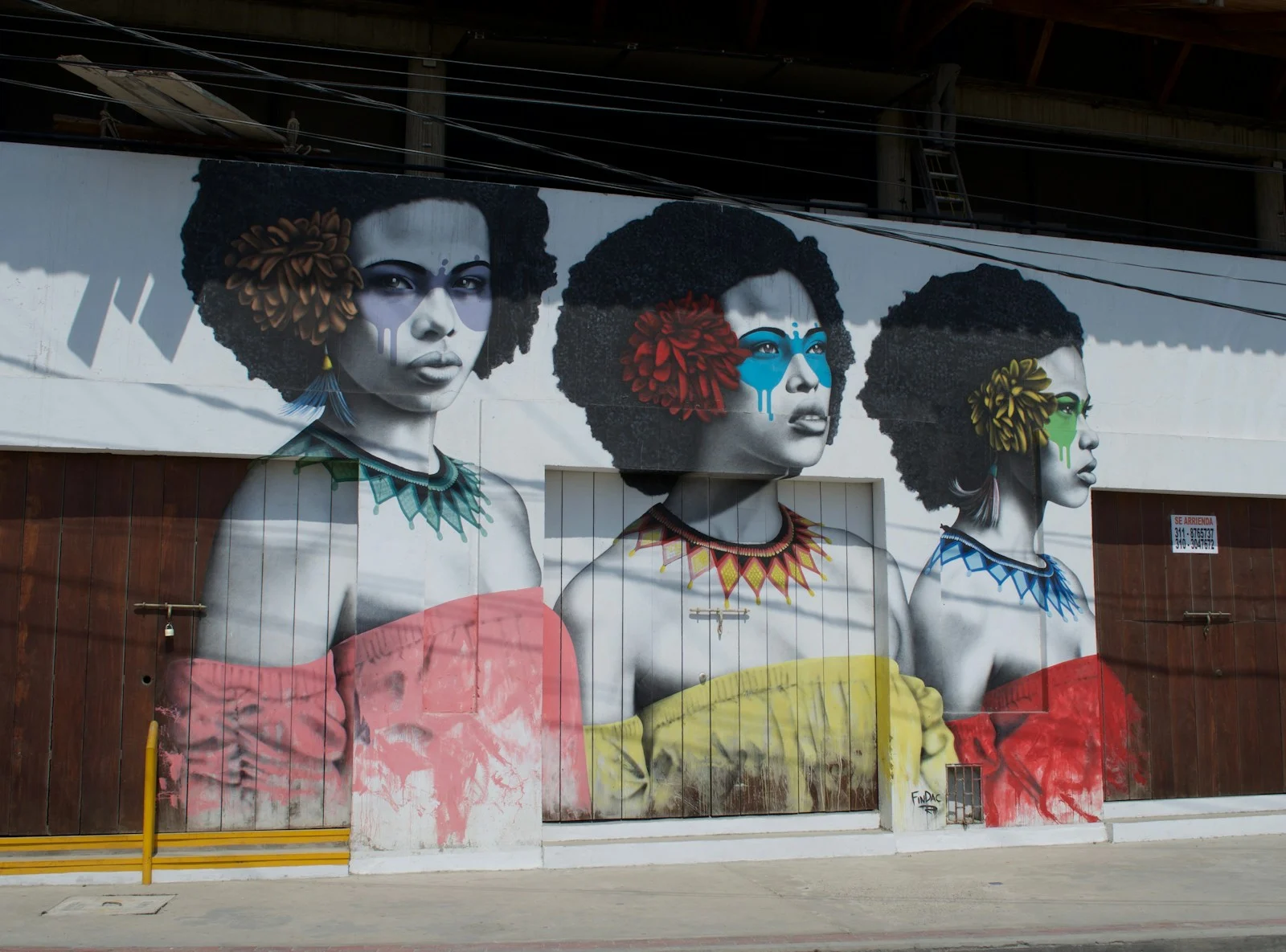 man in red white and black plaid dress shirt